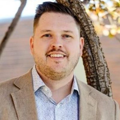 Photographic portrait of Brandon Ehrhart, Director of IT & Internet Mogul