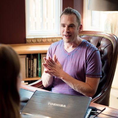 Dave Kersting sitting across from client behind a desk